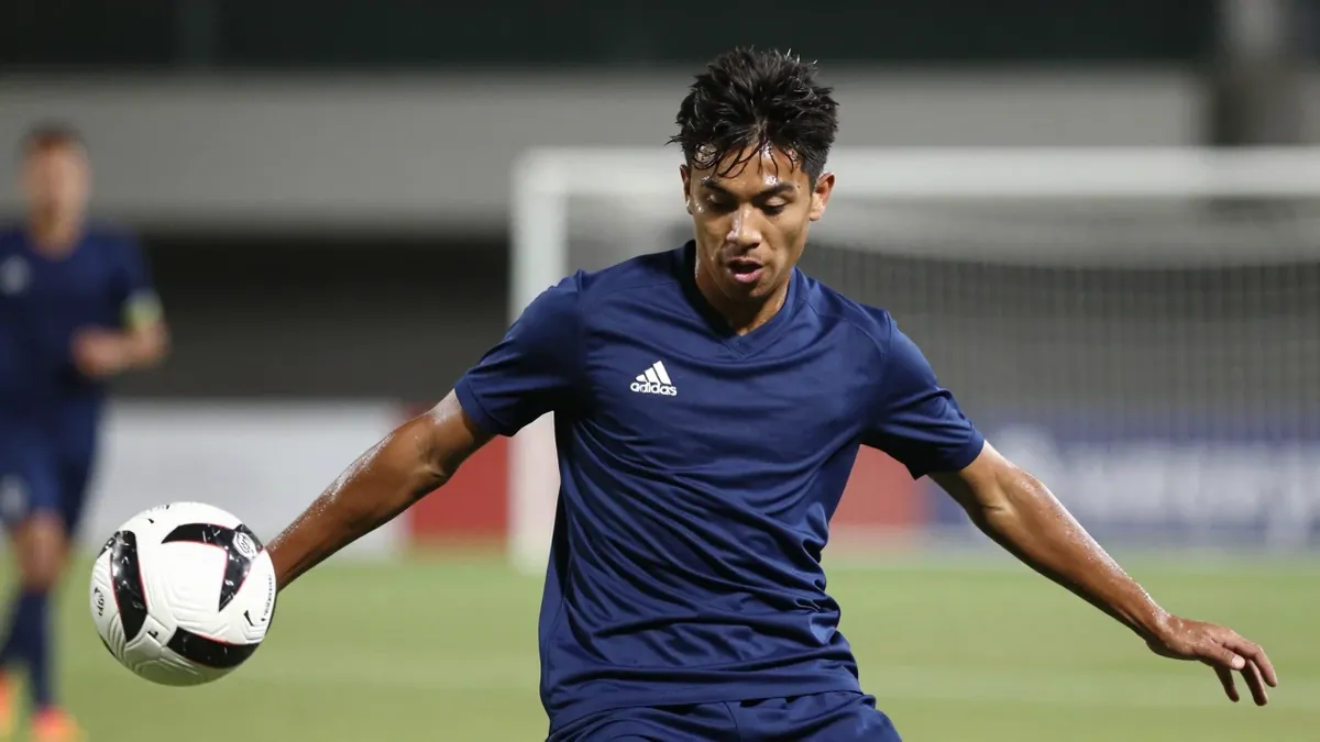 Falkirk's Ethan Ross showed his quality in a midfield battle with Rangers' James Penrice during the William Hill...